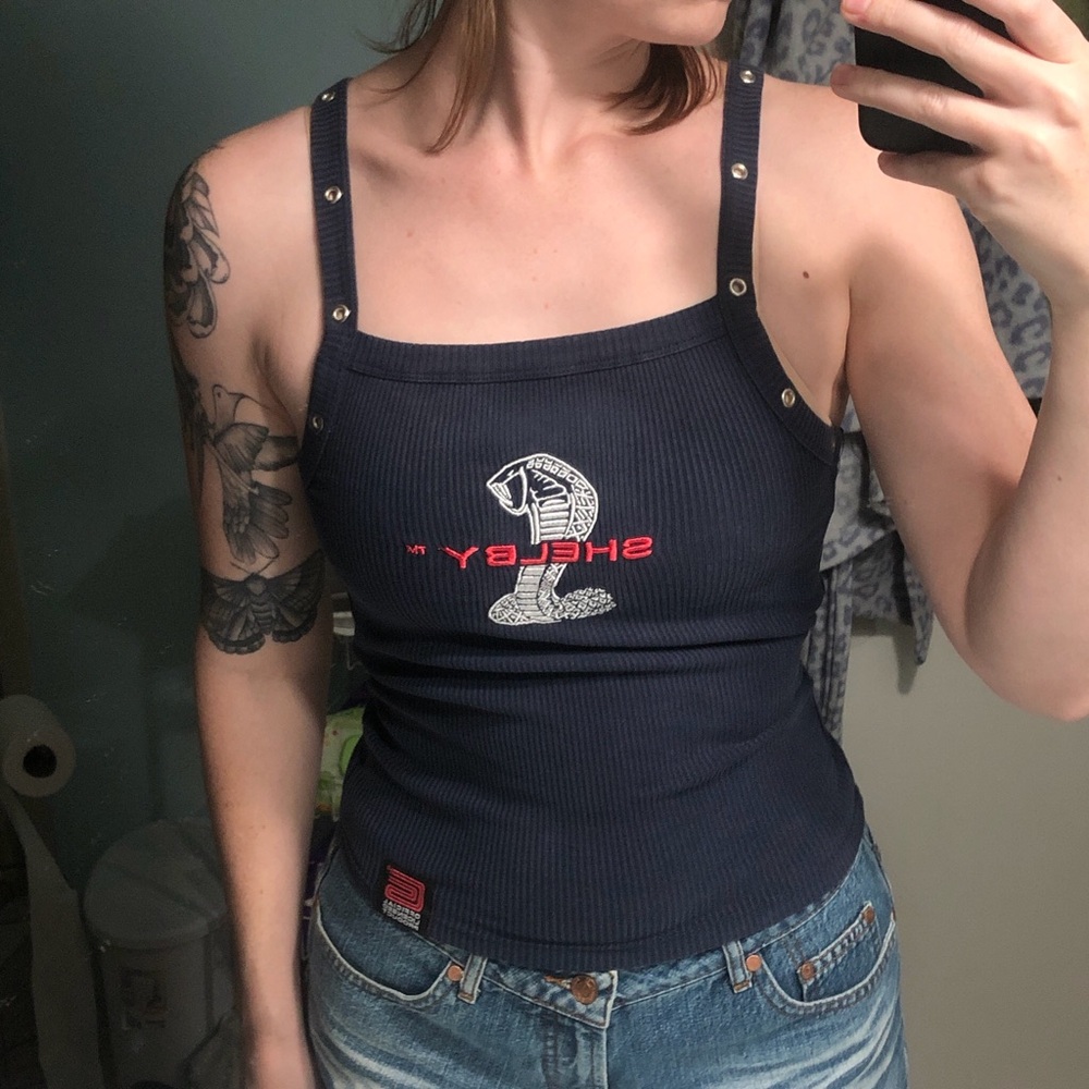 Shelby ribbed tank top with cobra embroidery and grommet accents